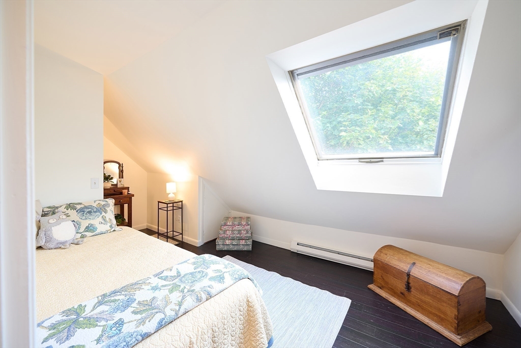 20 Manning Street, Unit 2 Ipswich, MA 01938 - Photo 20 of 27 a bedroom with a bed and a window