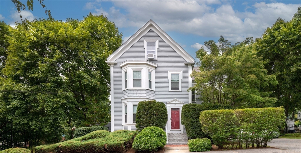 20 Manning Street, Unit 2 Ipswich, MA 01938 - Photo 26 of 27 a front view of a house with a yard