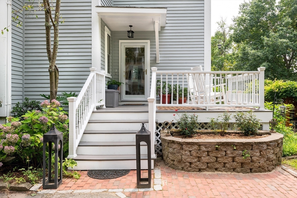 20 Manning Street, Unit 2 Ipswich, MA 01938 - Photo 3 of 27 a view of a house with a small garden