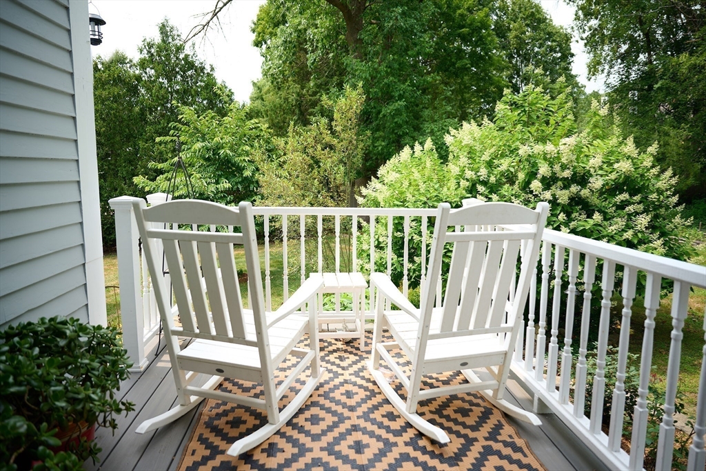 20 Manning Street, Unit 2 Ipswich, MA 01938 - Photo 4 of 27 a view of a balcony with wooden floor