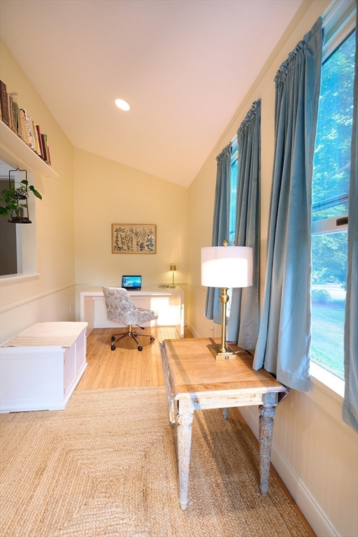 20 Manning Street, Unit 2 Ipswich, MA 01938 - Photo 9 of 27 a bed room with a bed and large window