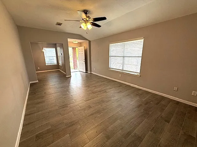 a house view with a backyard space