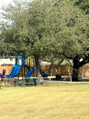 a view of a sink and dishwasher with a vanity