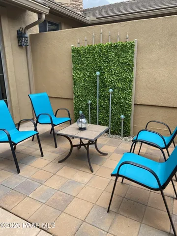 a building outdoor space with patio furniture