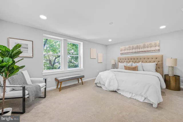 a bed room with a bed and a couch