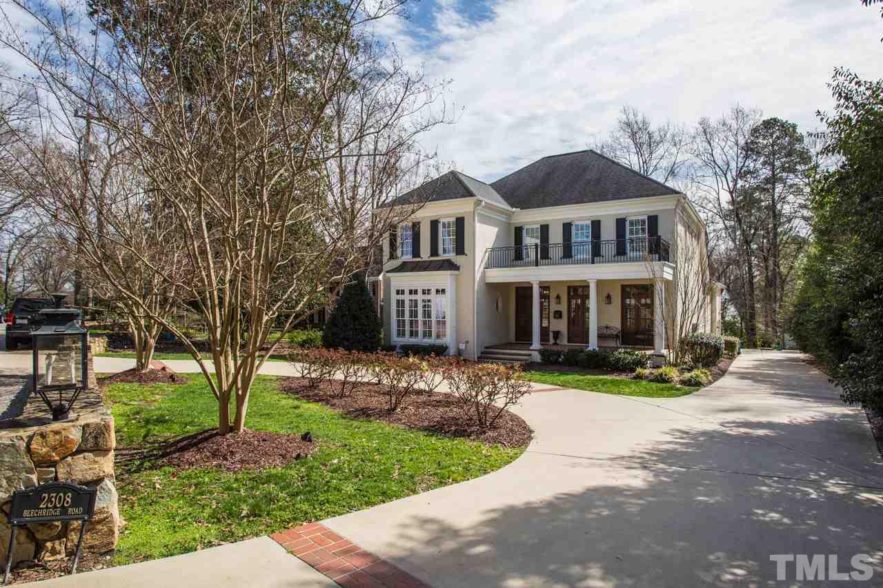 2308 Beechridge Road Raleigh, NC 27608 - Photo 3 of 27 a front view of a house with a garden