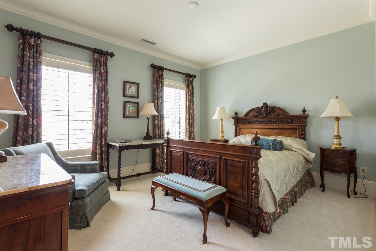 2308 Beechridge Road Raleigh, NC 27608 - Photo 22 of 27 a bed room with furniture and a window