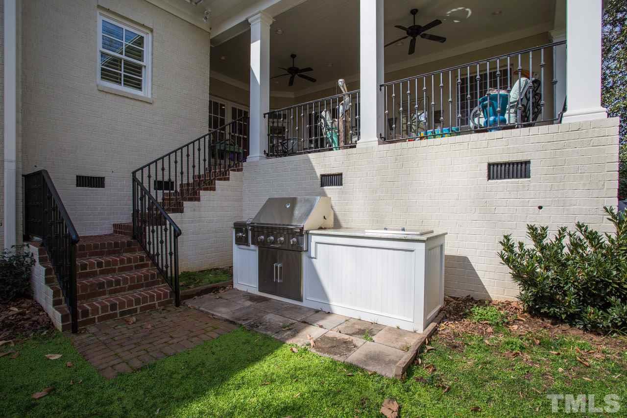 2308 Beechridge Road Raleigh, NC 27608 - Photo 27 of 27 a view of backyard of house with seating space