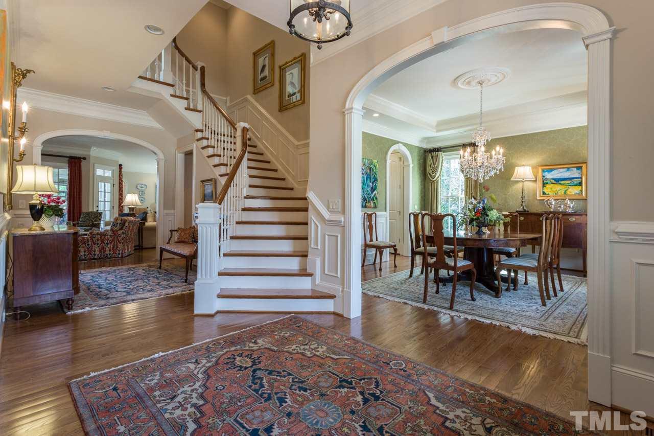 2308 Beechridge Road Raleigh, NC 27608 - Photo 5 of 27 an entryway a dining room and hall with wooden floor
