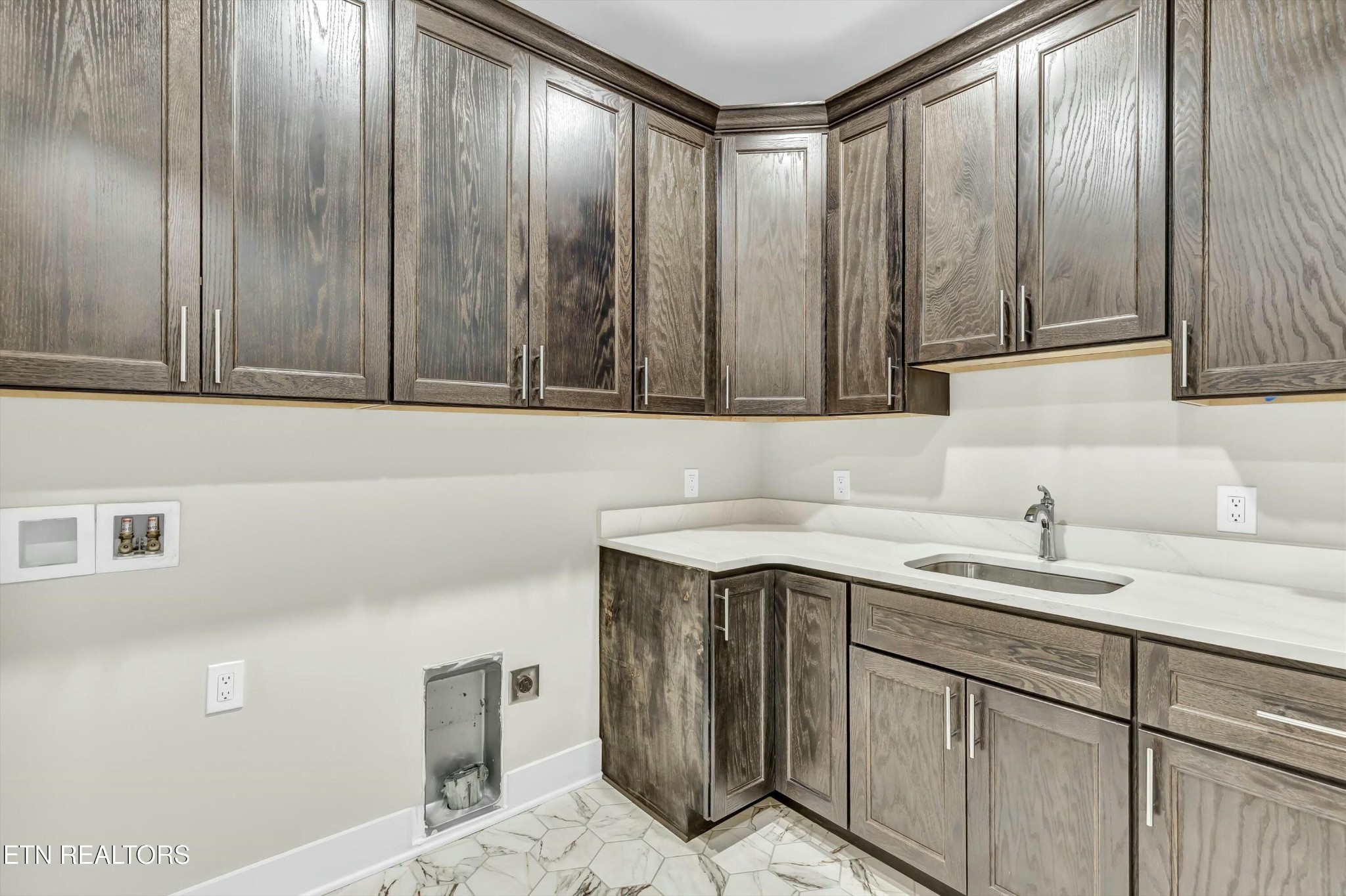 819 Anchor Vista Road Knoxville, TN 37934 - Photo 15 of 31 a kitchen with a sink cabinets and wooden floor