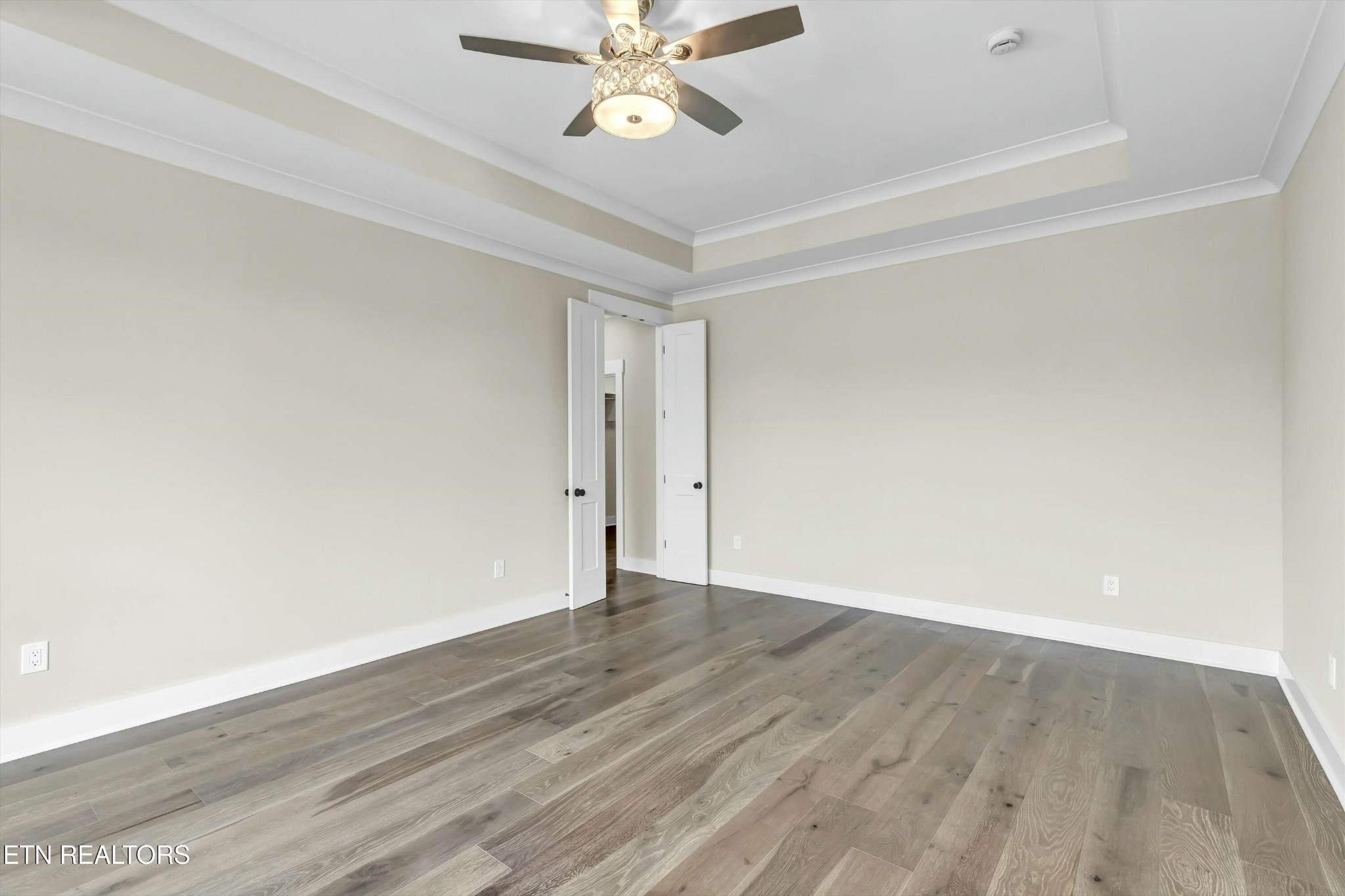 819 Anchor Vista Road Knoxville, TN 37934 - Photo 17 of 31 a view of an empty room with wooden floor