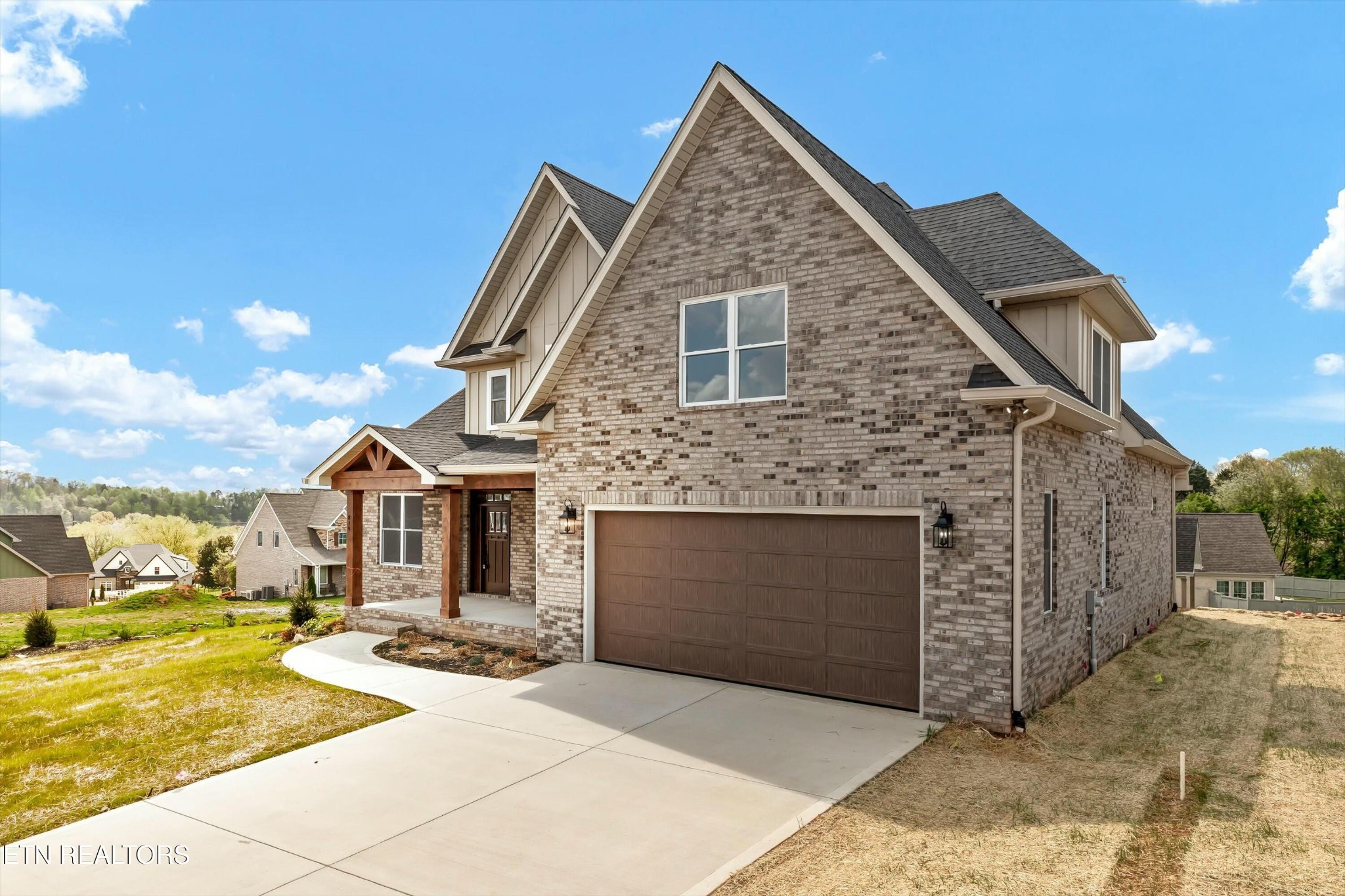 819 Anchor Vista Road Knoxville, TN 37934 - Photo 2 of 31 a front view of a house with yard