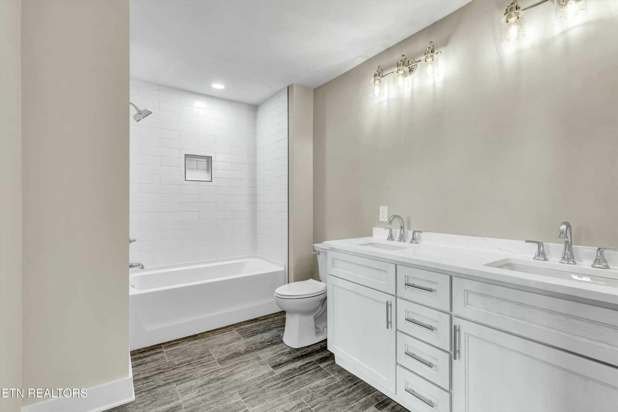 819 Anchor Vista Road Knoxville, TN 37934 - Photo 21 of 31 a bathroom with a toilet sink and a mirror
