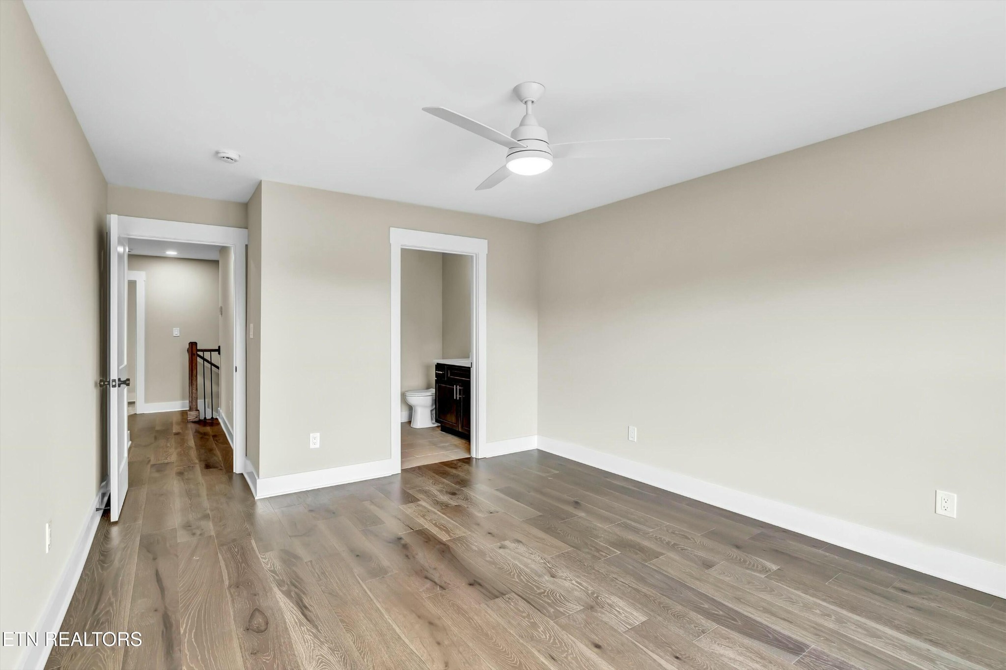 819 Anchor Vista Road Knoxville, TN 37934 - Photo 25 of 31 a view of an empty room with wooden floor