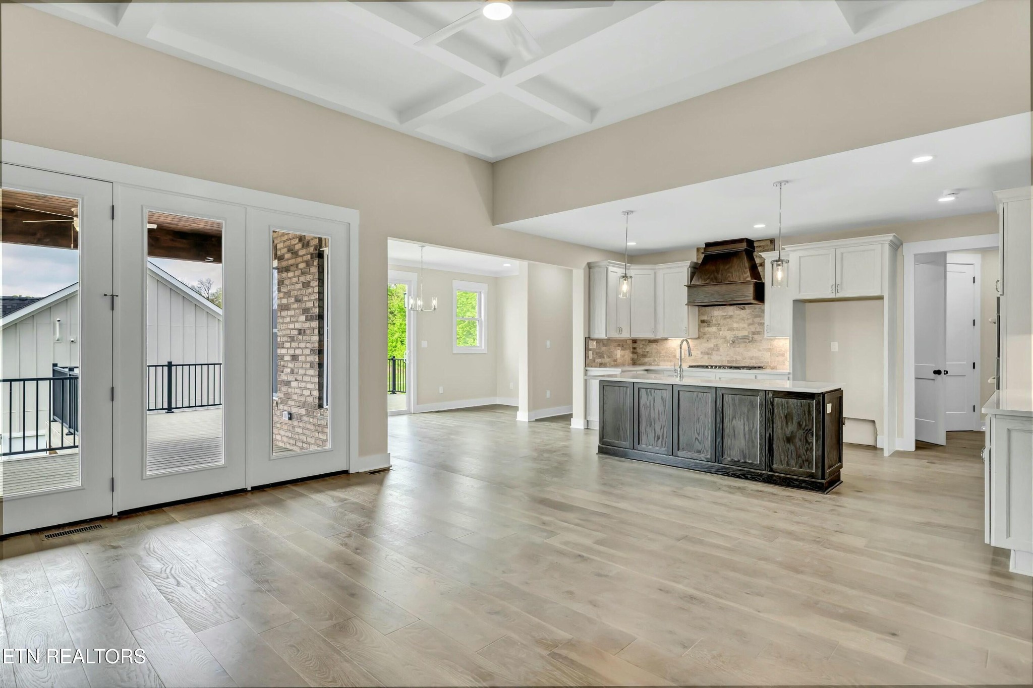 819 Anchor Vista Road Knoxville, TN 37934 - Photo 8 of 31 a large kitchen with stainless steel appliances granite countertop a large counter top and a wooden floors