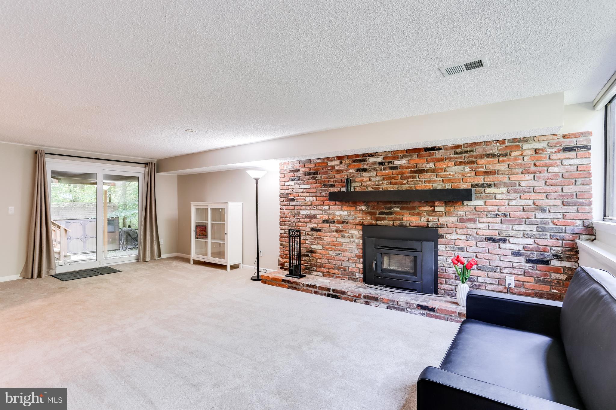 9514 Good Lion Road Columbia, MD 21045 - Photo 24 of 30 Relax by the cozy fireplace