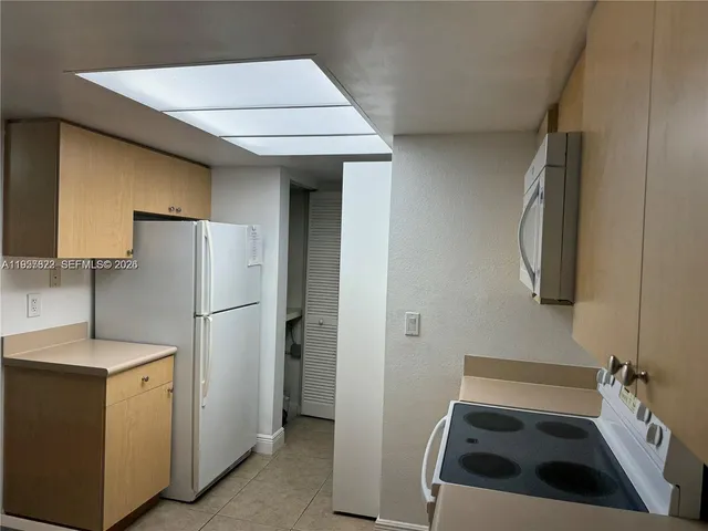 a storage room with washer and dryer