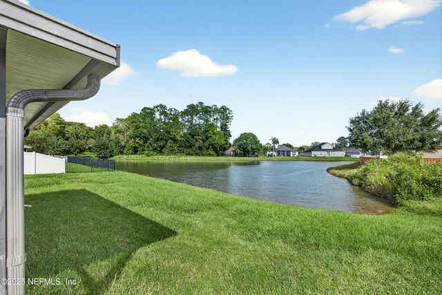 a view of a lake from a yard
