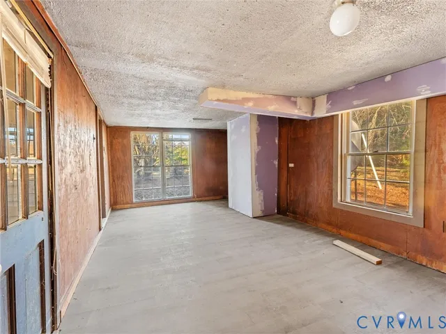 an empty room with windows