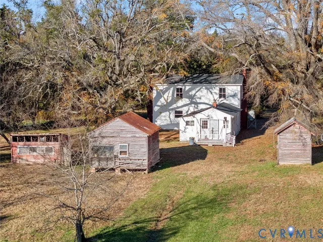 a view of a large house with a yard