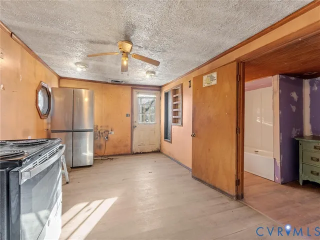 a view of a kitchen with a sink and a stove