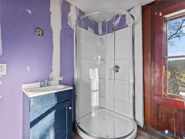 a bathroom with a sink toilet