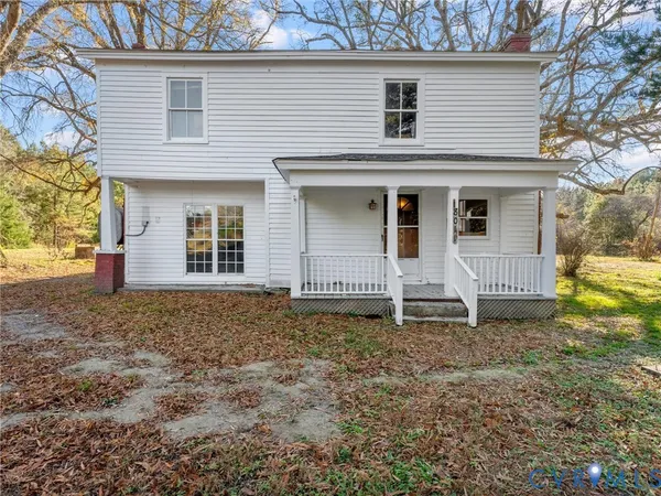 a house with trees in front of it
