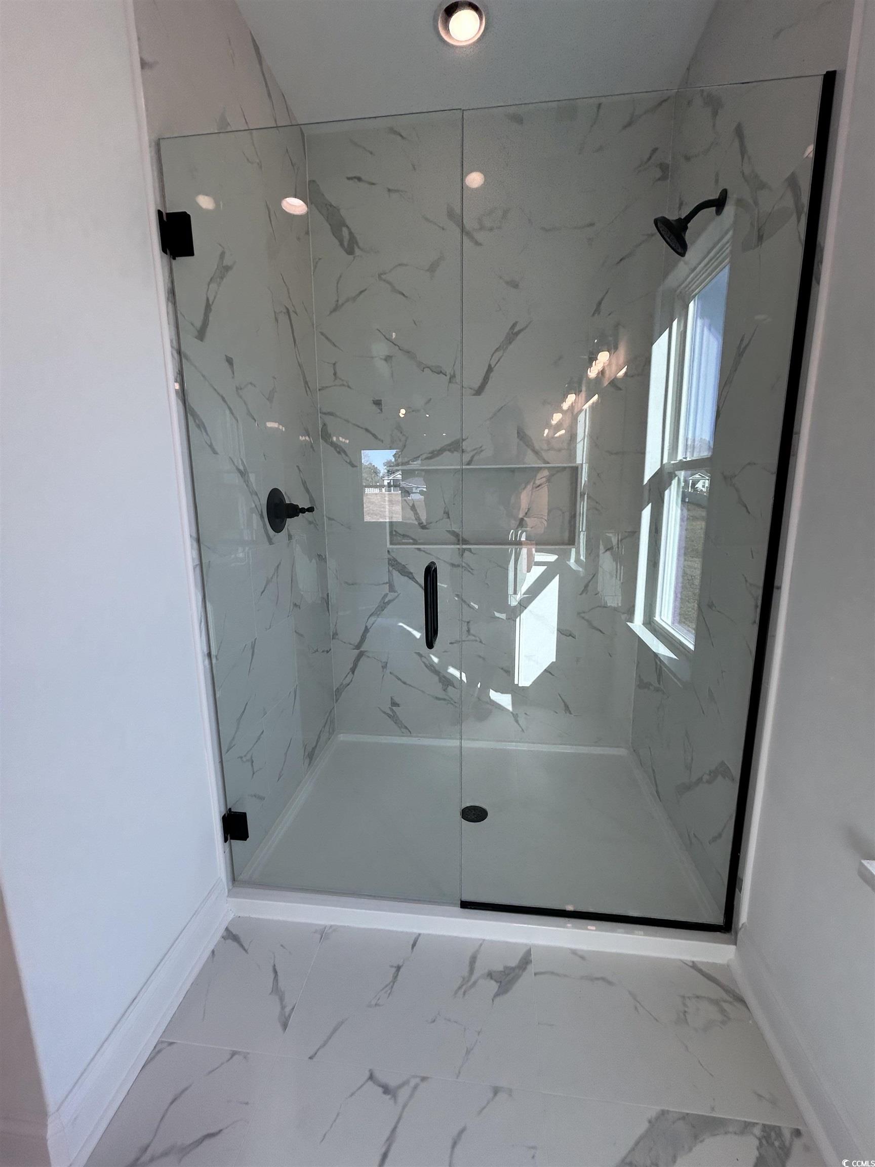 518 War Eagle Court Longs, SC 29568 - Photo 15 of 23 Bathroom featuring walk in shower