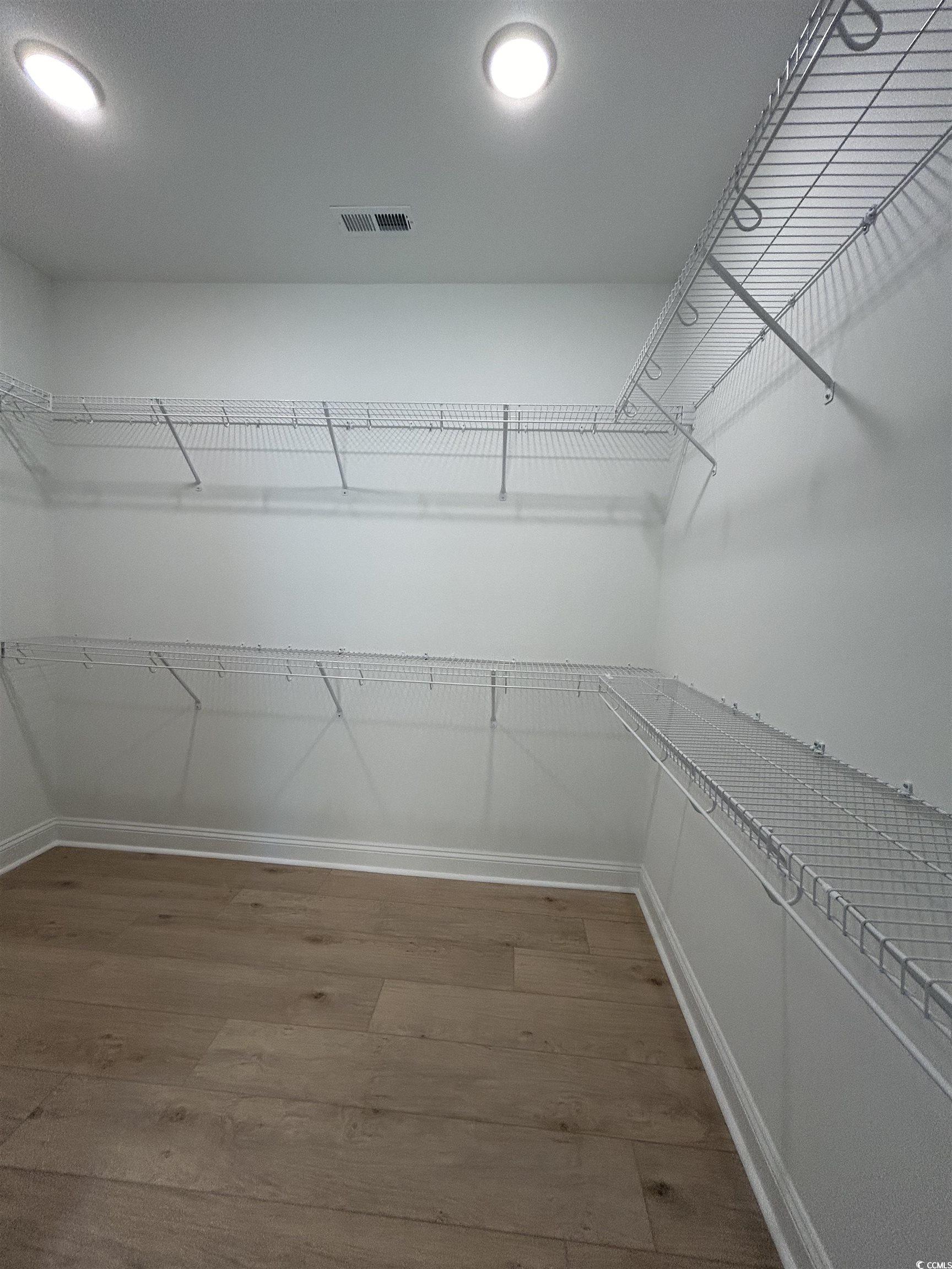 518 War Eagle Court Longs, SC 29568 - Photo 16 of 23 Spacious closet featuring hardwood / wood-style fl