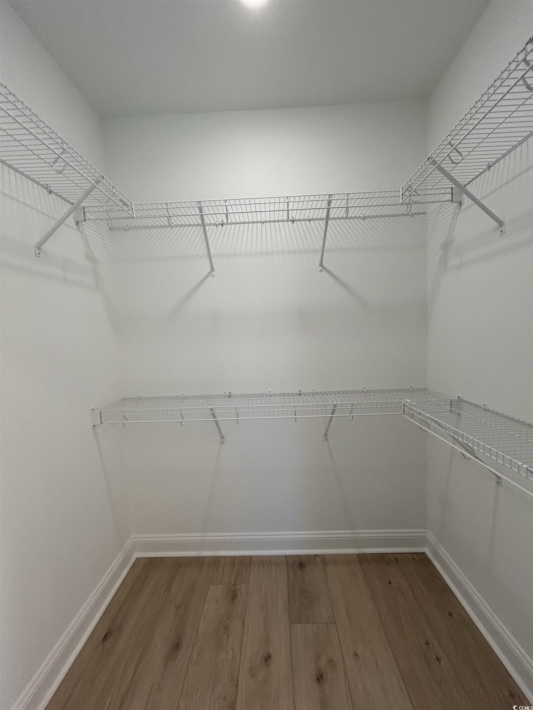 518 War Eagle Court Longs, SC 29568 - Photo 17 of 23 Spacious closet featuring hardwood / wood-style fl