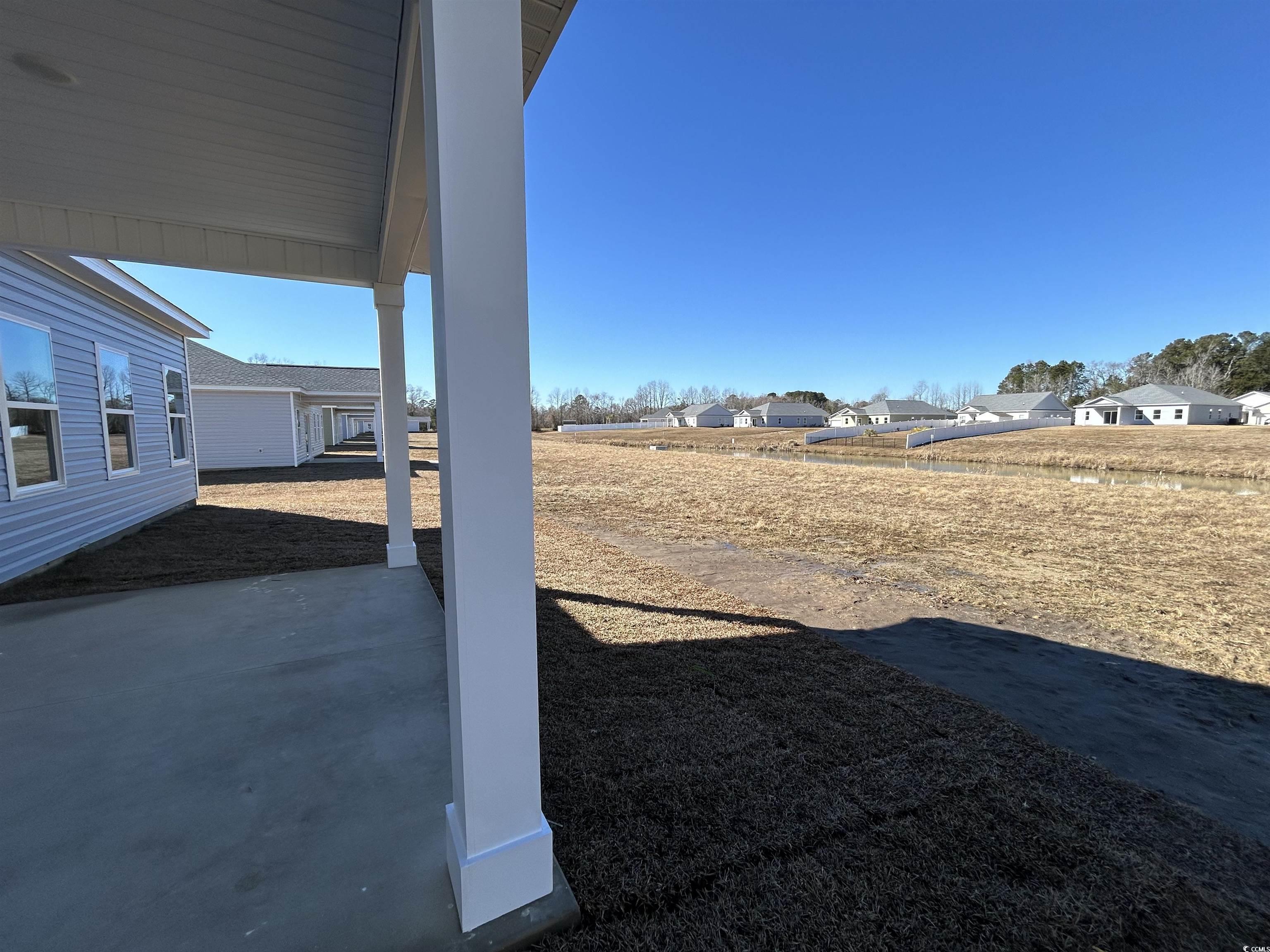 518 War Eagle Court Longs, SC 29568 - Photo 22 of 23 View of yard featuring a patio