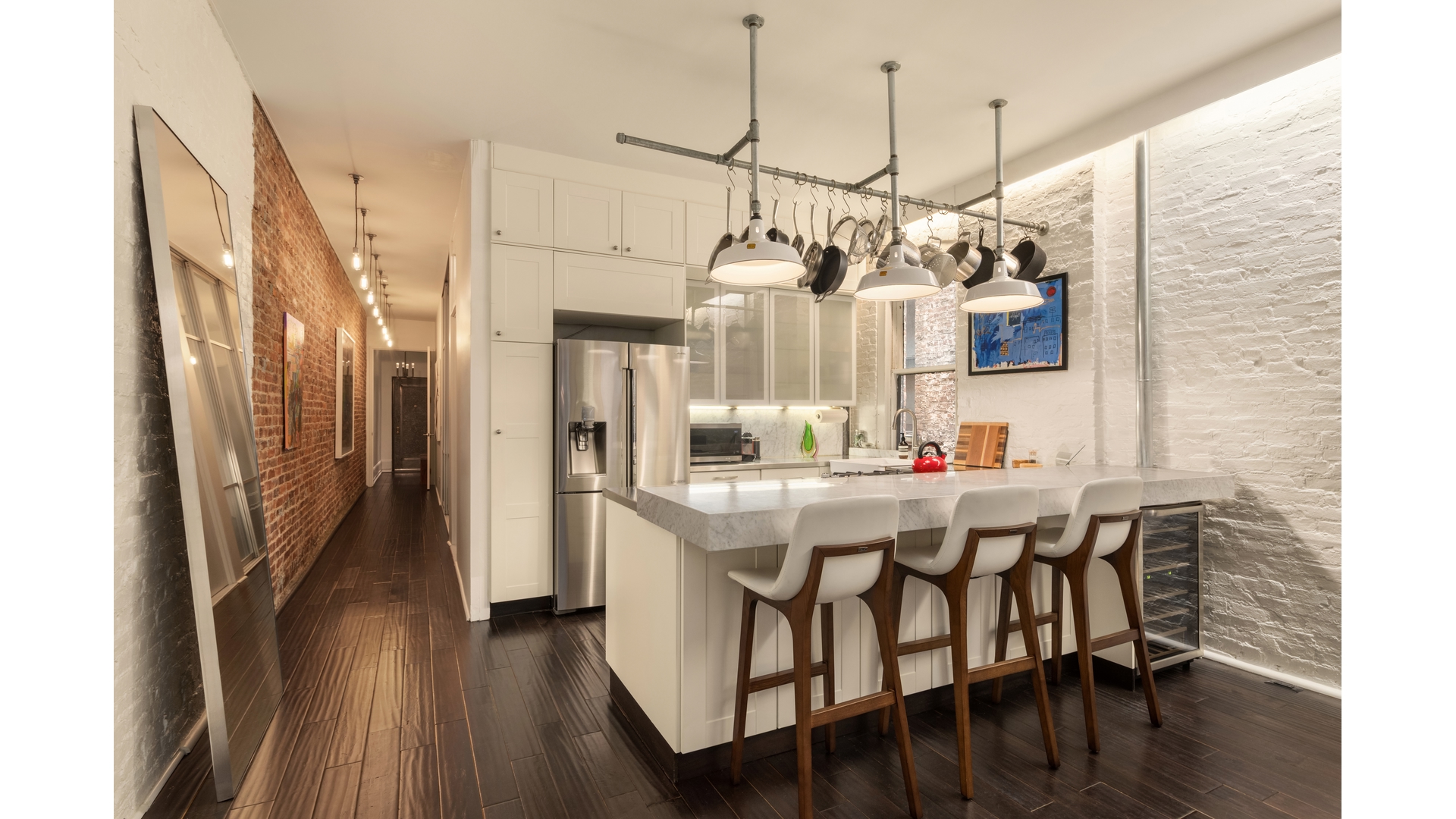396 3rd Street, Unit SIX Brooklyn, NY 11215 - Photo 1 of 11 a kitchen with stainless steel appliances granite countertop a kitchen island hardwood floor and a sink