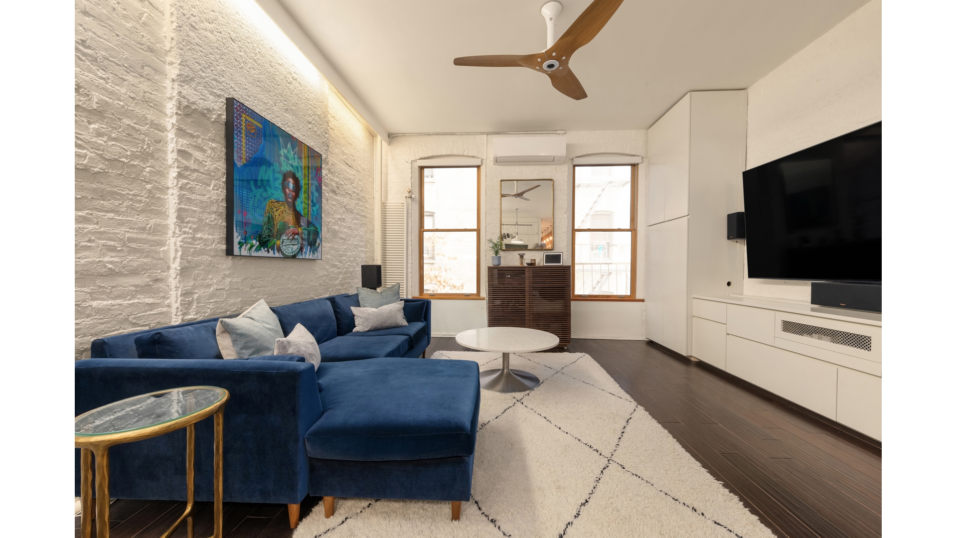 396 3rd Street, Unit SIX Brooklyn, NY 11215 - Photo 5 of 11 a living room with furniture and a flat screen tv