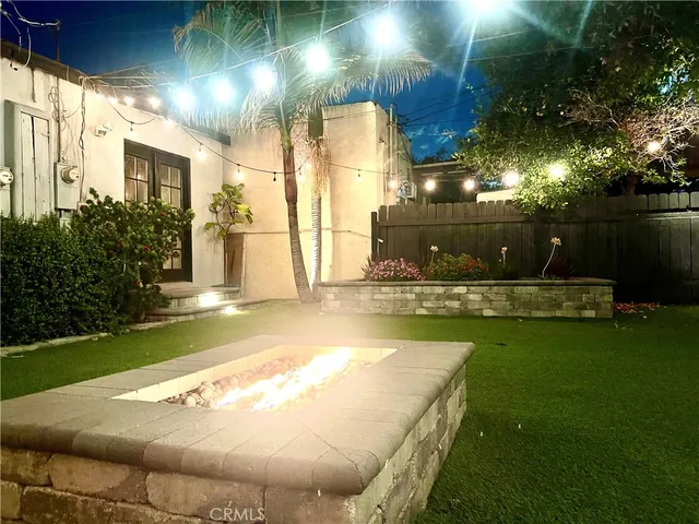 a view of a swimming pool with a yard