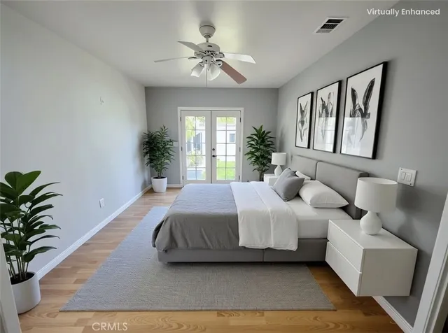 a spacious bedroom with a bed and a couch