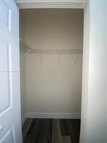 a view of small space with racks on the wall