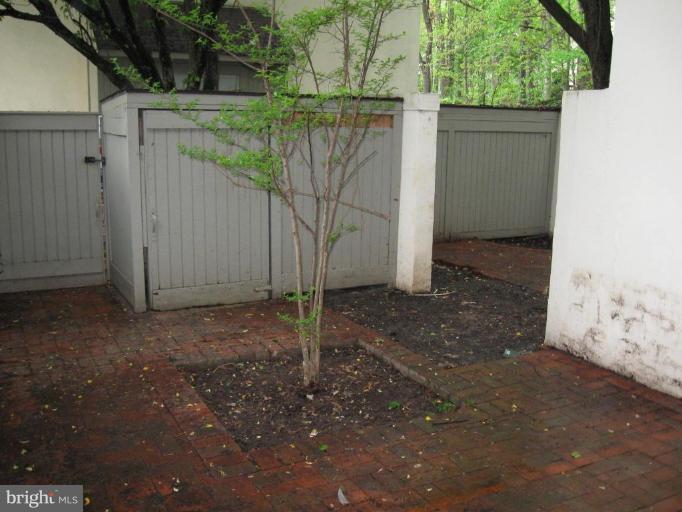 1527 Inlet Court Reston, VA 20190 - Photo 11 of 11 Nice Brick Patio enclosed in front yard.