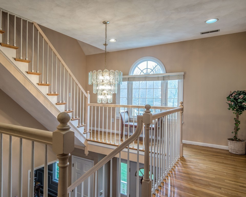 6 Hawk Ridge Road Andover, MA 01810 - Photo 3 of 28 a view of an entryway wooden floor and a window