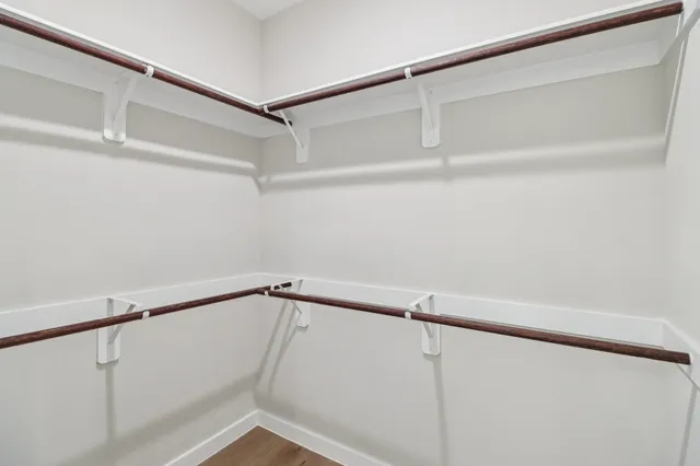 a view of a room with racks on the wall