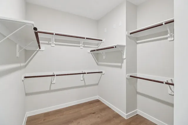 a view of an empty walk in closet