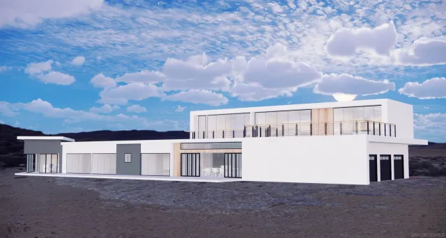 a view of a dining room with furniture and a window