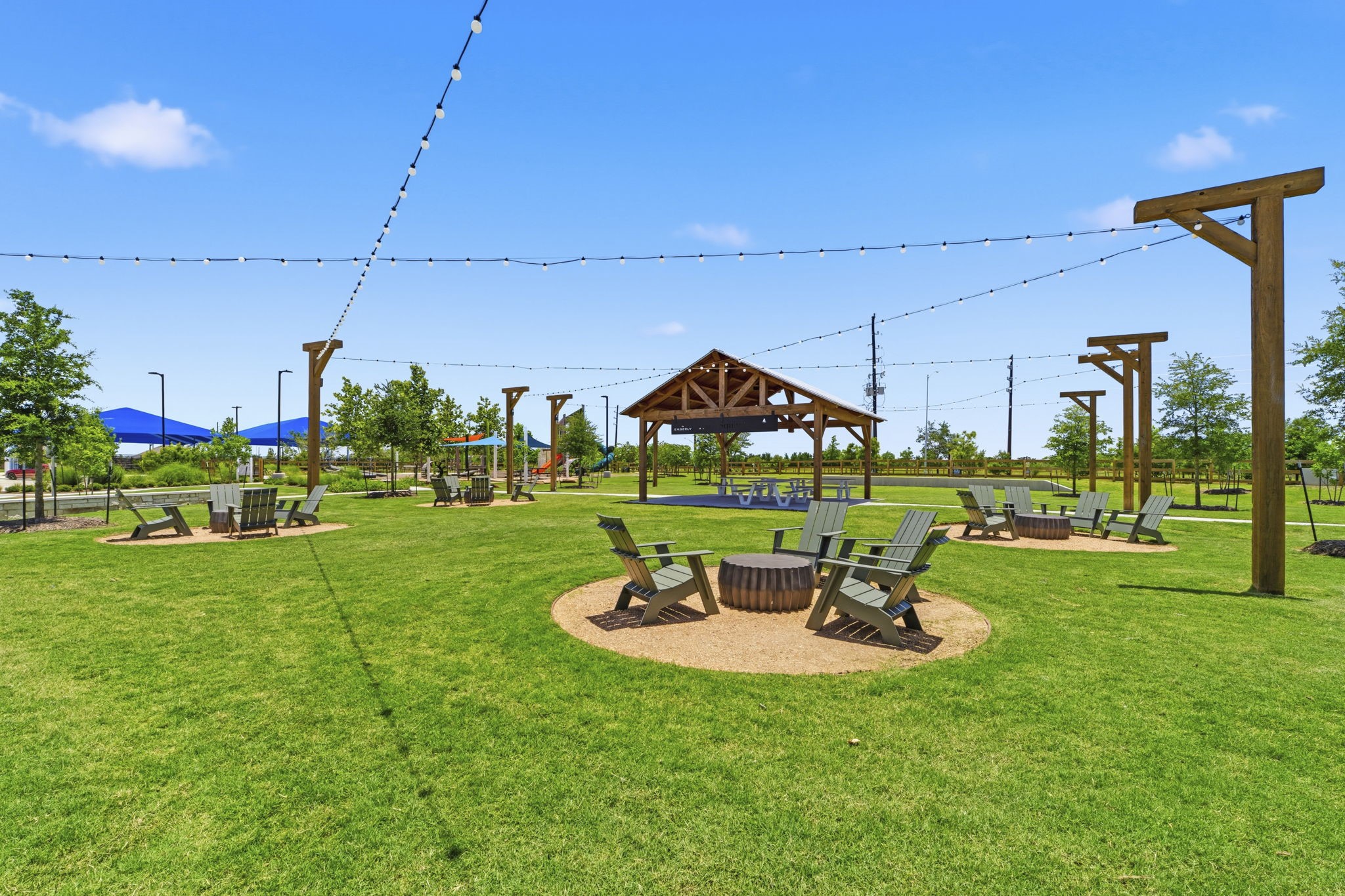 10934 Bonfire Trail Beasley, TX 77417 - Photo 30 of 32 Spacious event lawn with pavilion and gathering areas for community events and outdoor relaxation.