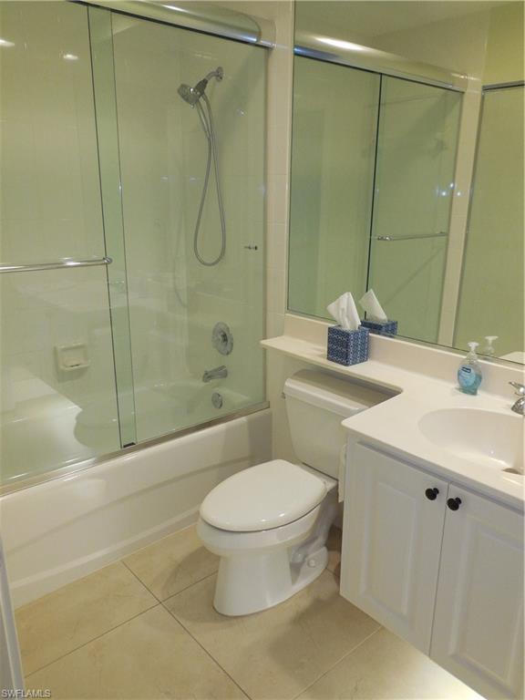 3703 Exuma Way Naples, FL 34119 - Photo 22 of 47 a bathroom with a sink toilet and shower