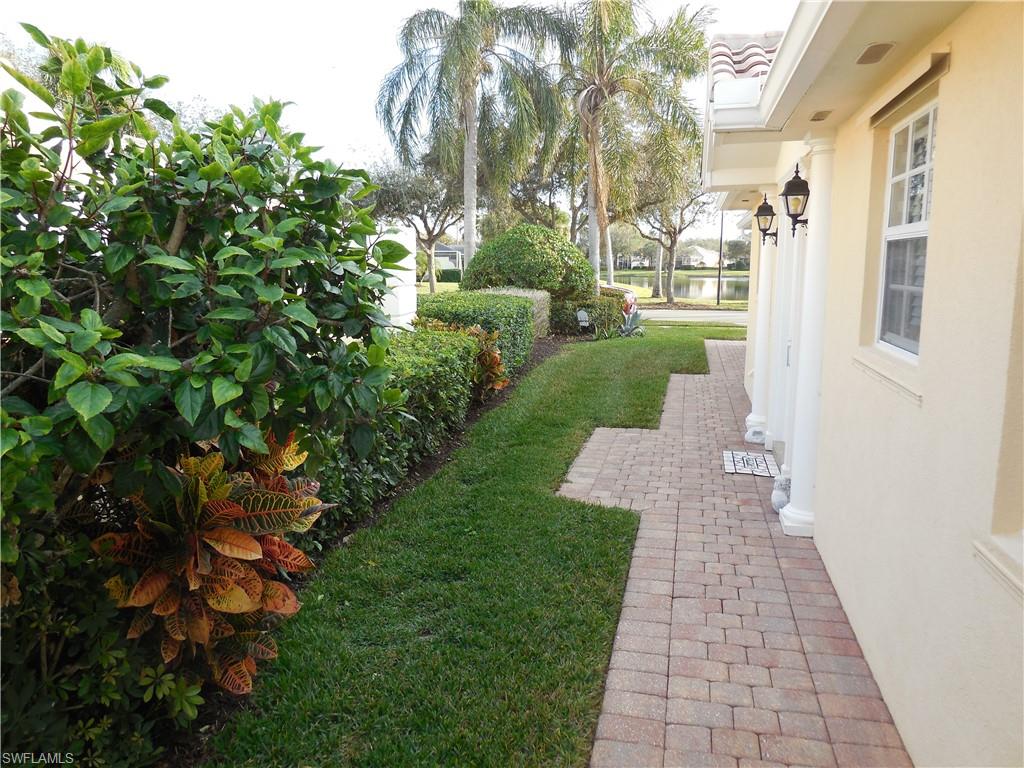 3703 Exuma Way Naples, FL 34119 - Photo 27 of 47 a view of a back yard
