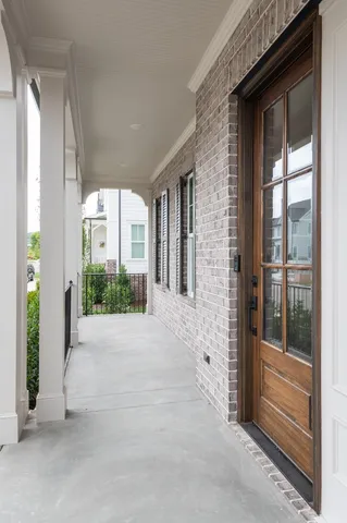 a view of a brick house with front door