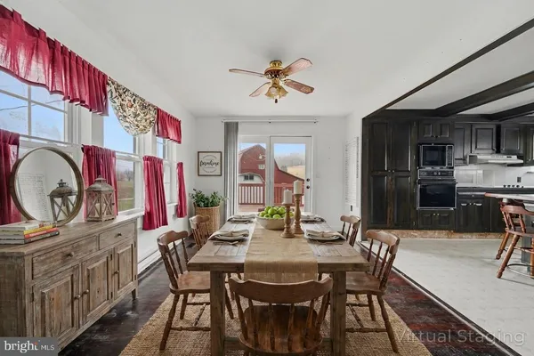 a view of a dining room with furniture