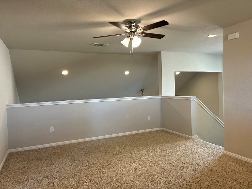 2212 Baugh Road Austin, TX 78754 - Photo 21 of 36 Empty room featuring light colored carpet, recessed lighting, and a ceiling fan