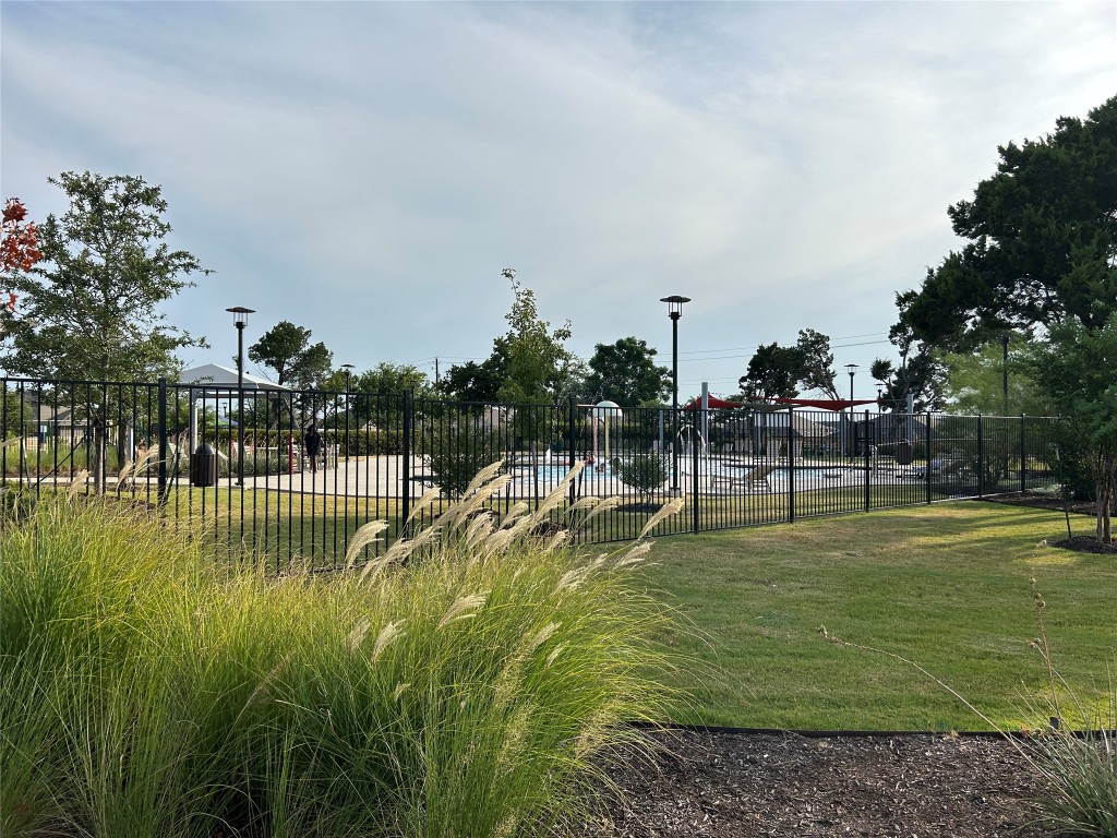2212 Baugh Road Austin, TX 78754 - Photo 33 of 36 community pool and play ground