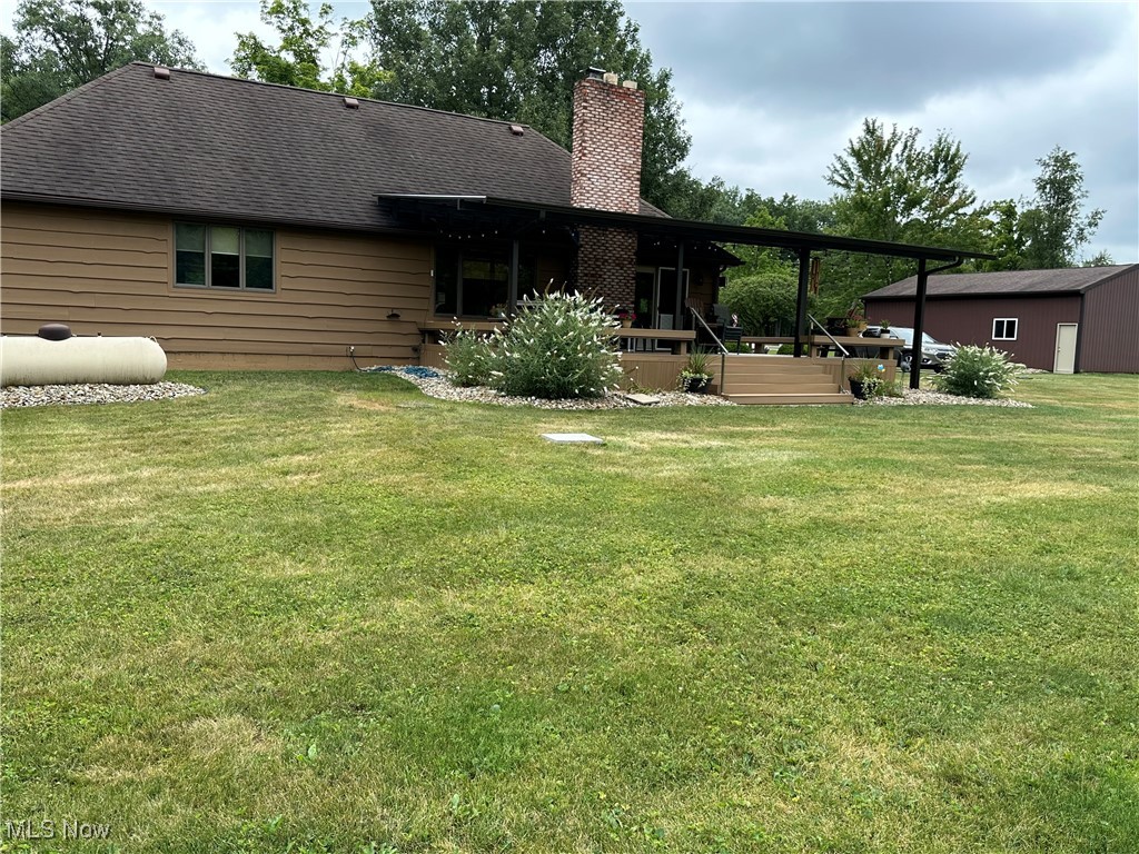 354 Big Bass Road Willard, OH 44890 - Photo 4 of 29 Back of property with a yard