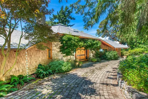 a view of swimming pool with outdoor seating